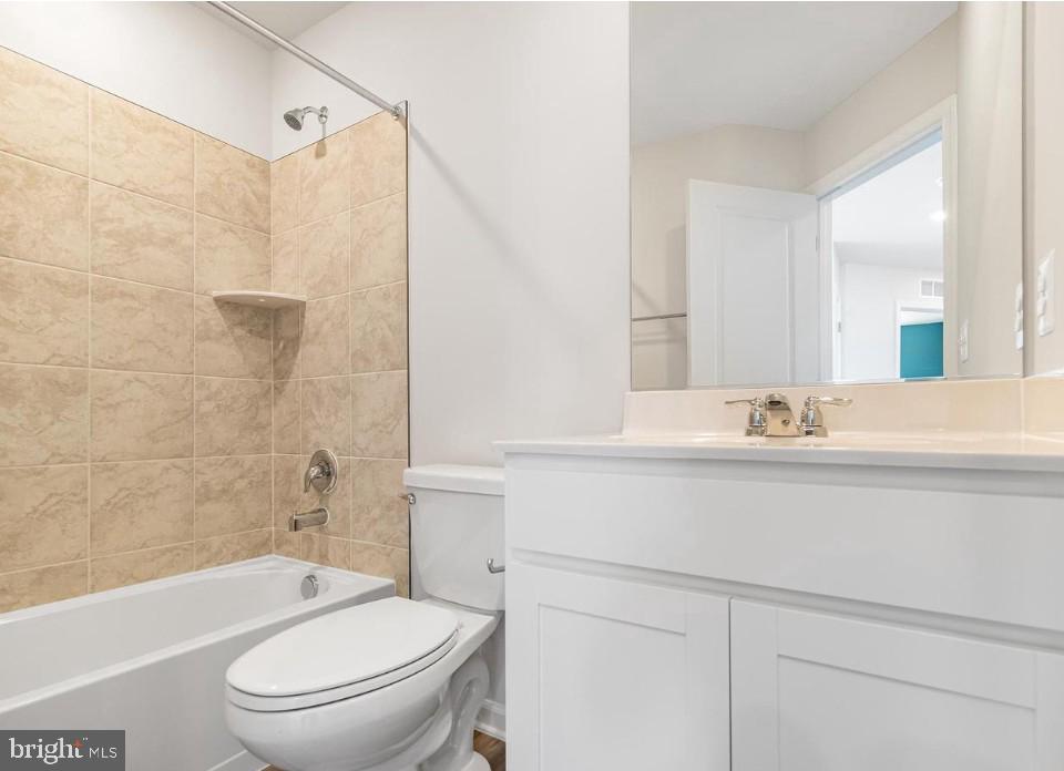 154 Cooperage Road Inwood, WV 25428 - Photo 10 of 19 a bathroom with a sink a toilet and a bathtub