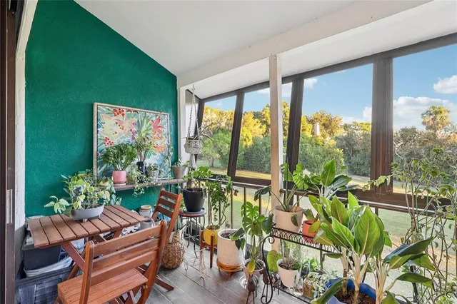 a view of outdoor space with deck and a garden