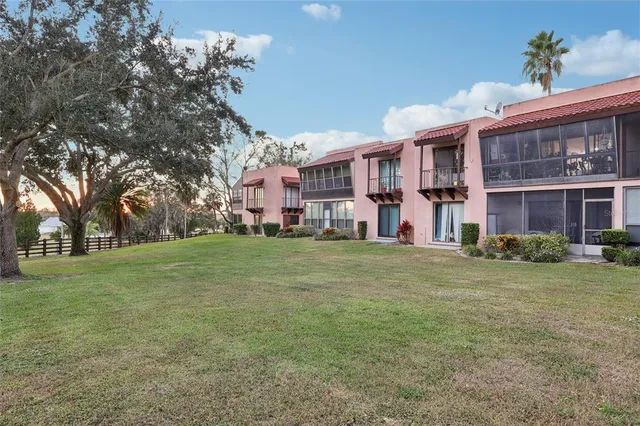 a picture of a wall with a white building