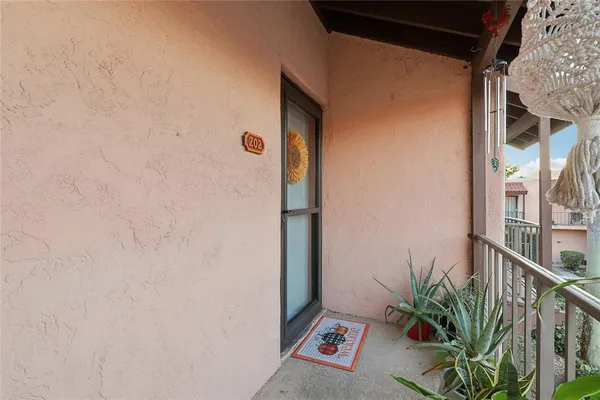 a potted plant on a brick wall