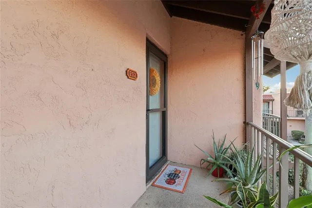 a potted plant on a brick wall