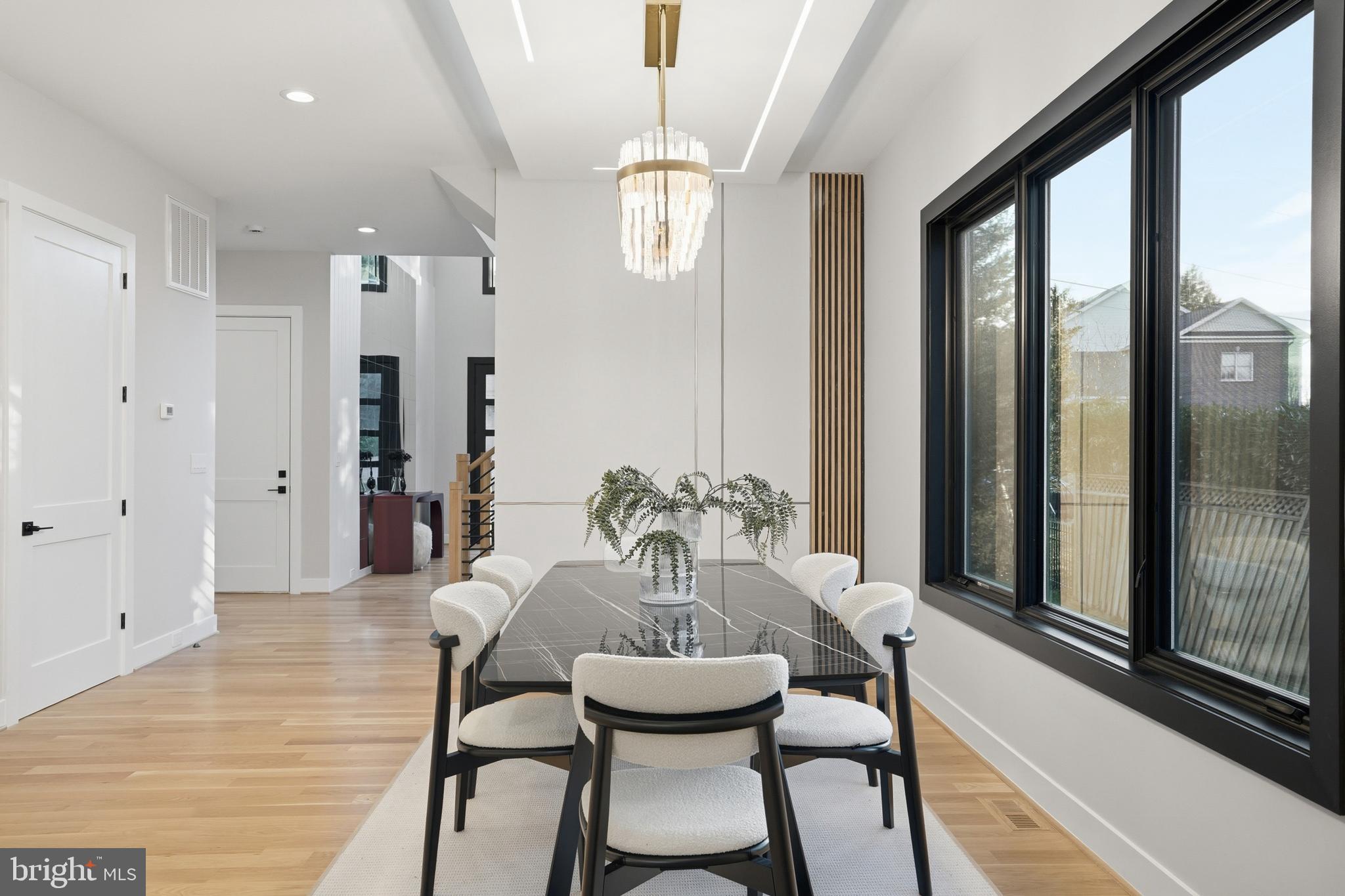 1805 Franklin Avenue McLean, VA 22101 - Photo 13 of 96 a view of a dining room with furniture window and wooden floor