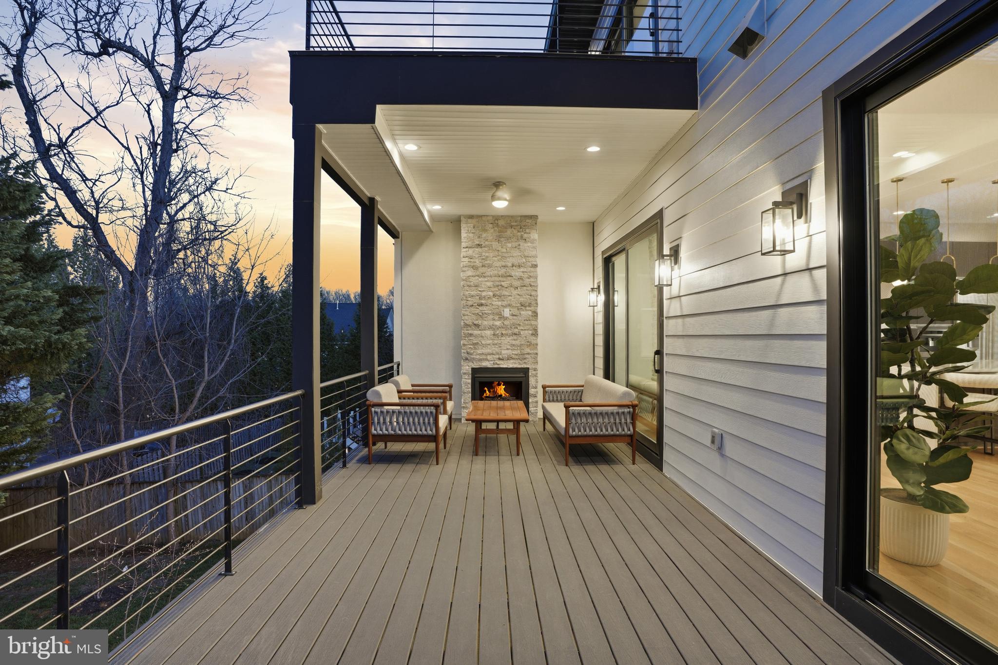 1805 Franklin Avenue McLean, VA 22101 - Photo 25 of 96 a view of a balcony with chairs and wooden floor