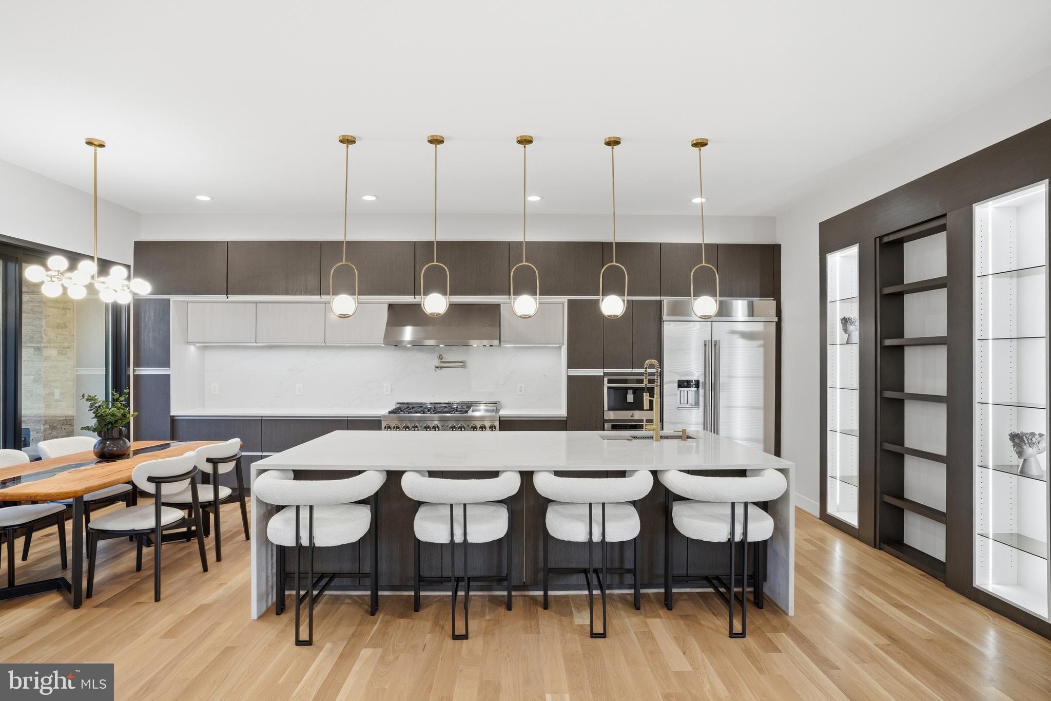 1805 Franklin Avenue McLean, VA 22101 - Photo 28 of 96 a kitchen with a dining table chairs and sink