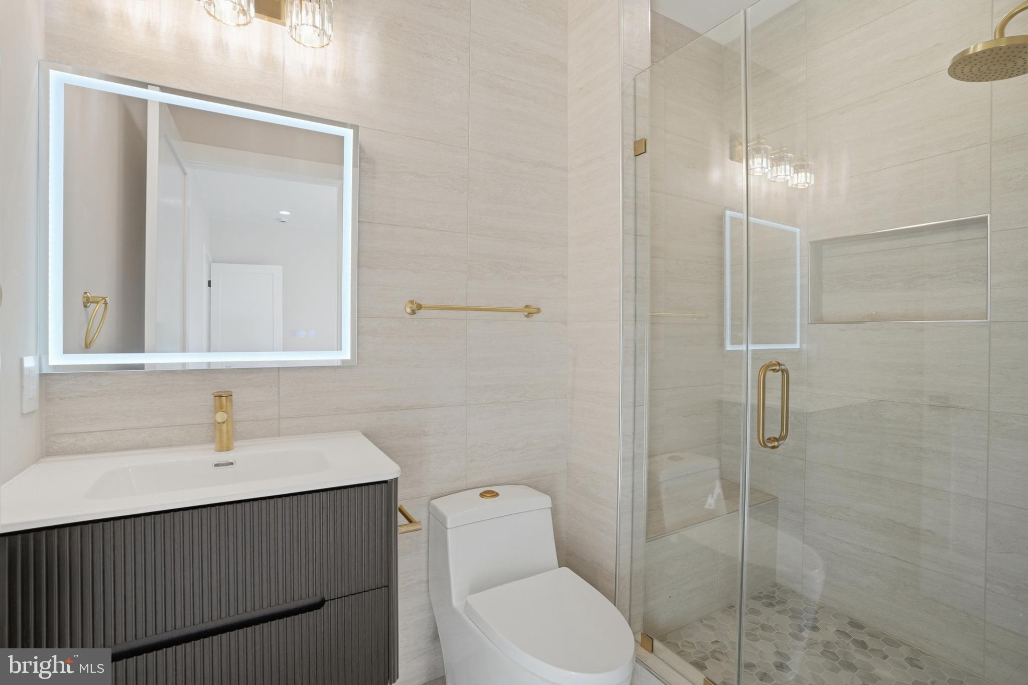 1805 Franklin Avenue McLean, VA 22101 - Photo 47 of 96 a bathroom with a sink a toilet and shower