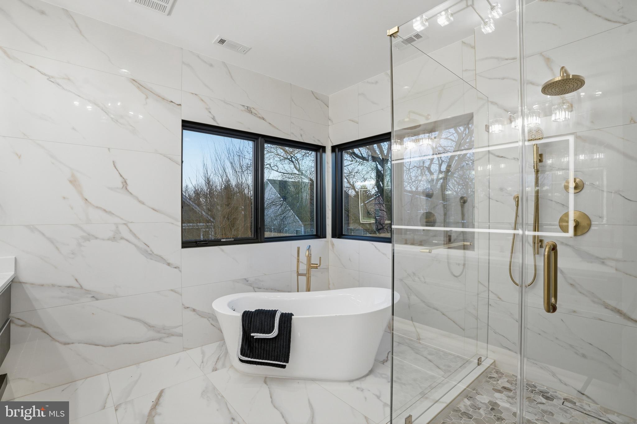 1805 Franklin Avenue McLean, VA 22101 - Photo 67 of 96 a bathroom with a bathtub and shower