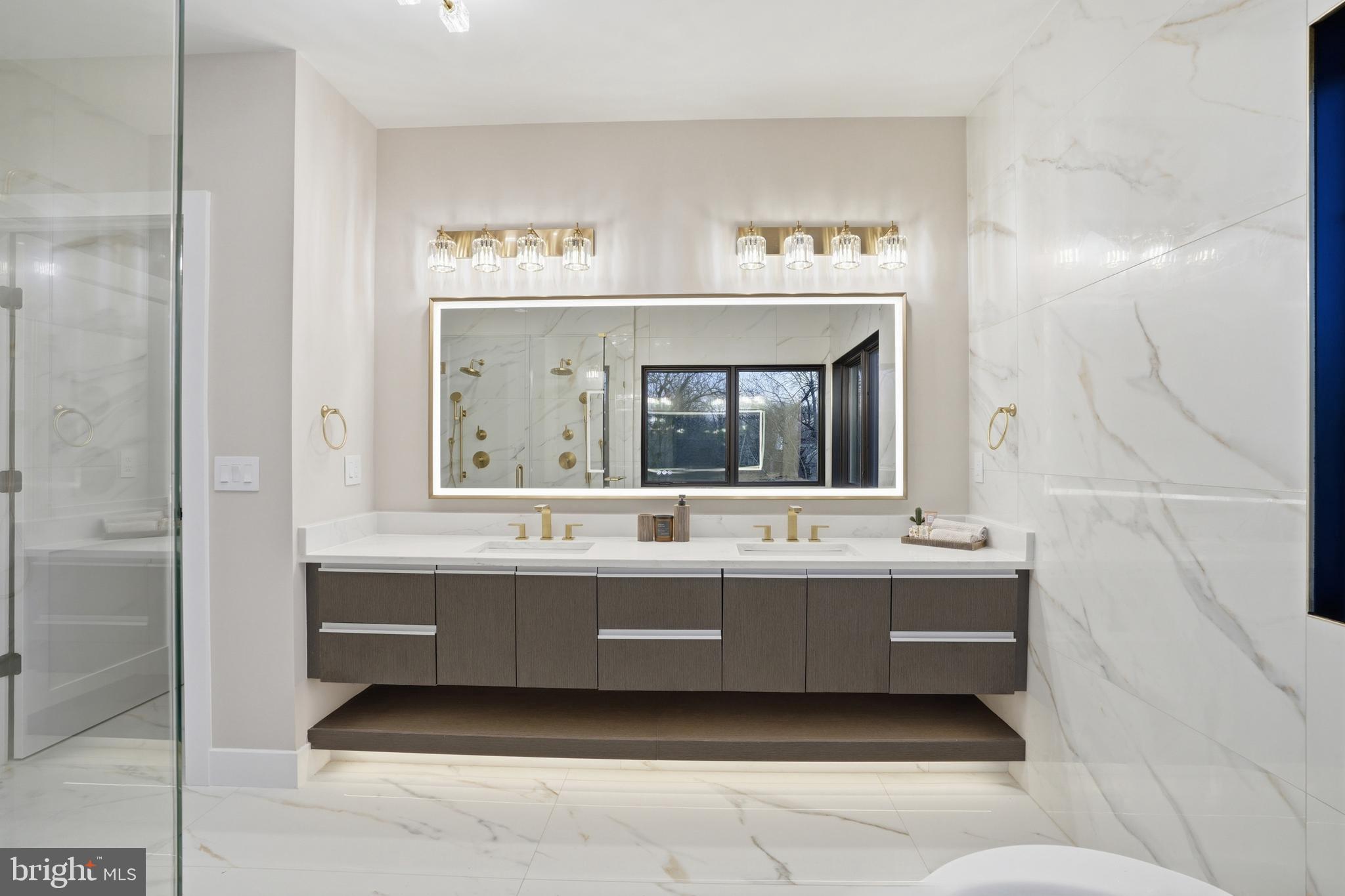 1805 Franklin Avenue McLean, VA 22101 - Photo 68 of 96 a bathroom with a sink and a mirror