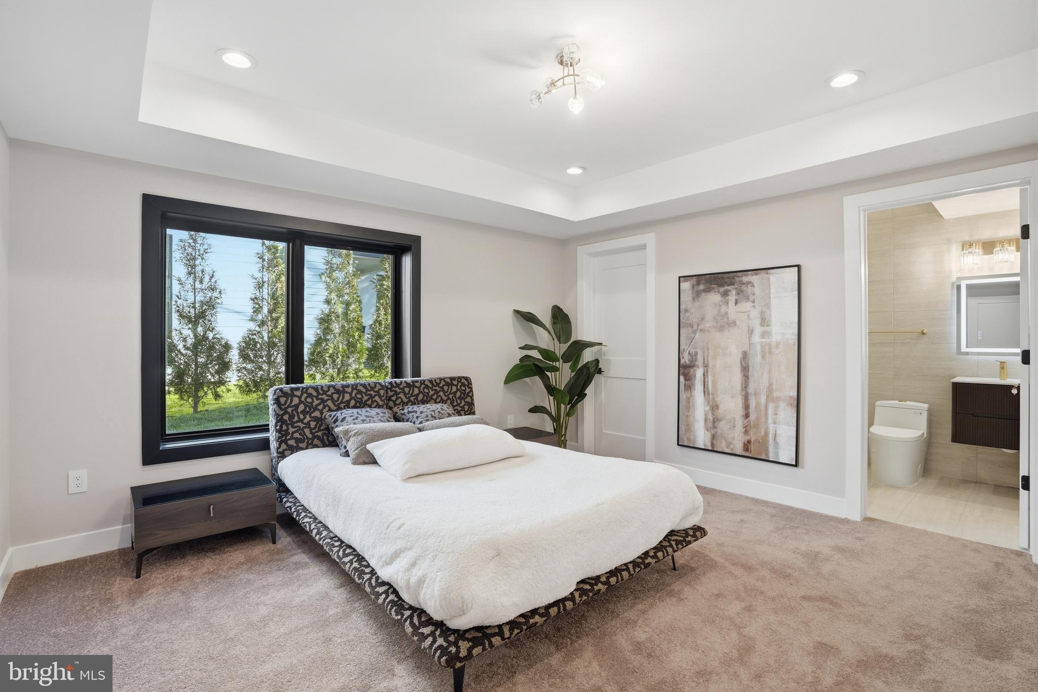 1805 Franklin Avenue McLean, VA 22101 - Photo 78 of 96 a bedroom with a large bed and a large window