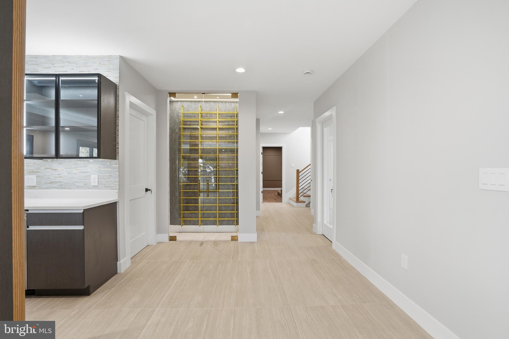 1805 Franklin Avenue McLean, VA 22101 - Photo 83 of 96 a view of an empty room with a fireplace and a window