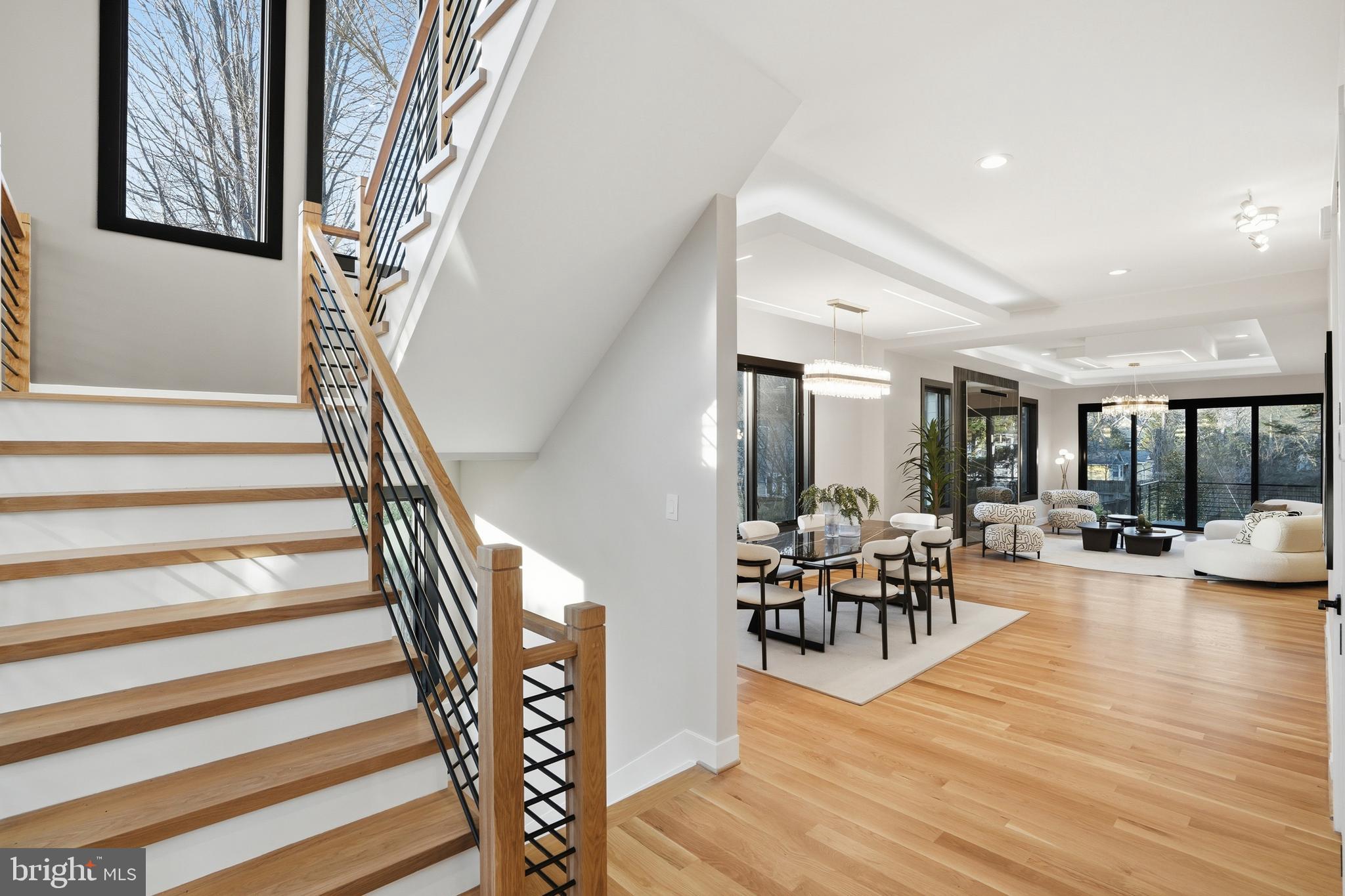 1805 Franklin Avenue McLean, VA 22101 - Photo 9 of 96 a view of a dining room with furniture a chandelier and wooden floor