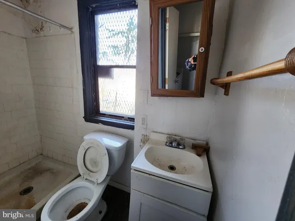 a view of a hallway with an empty room