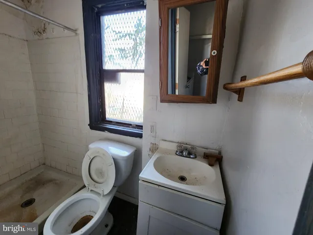 a view of a hallway with an empty room