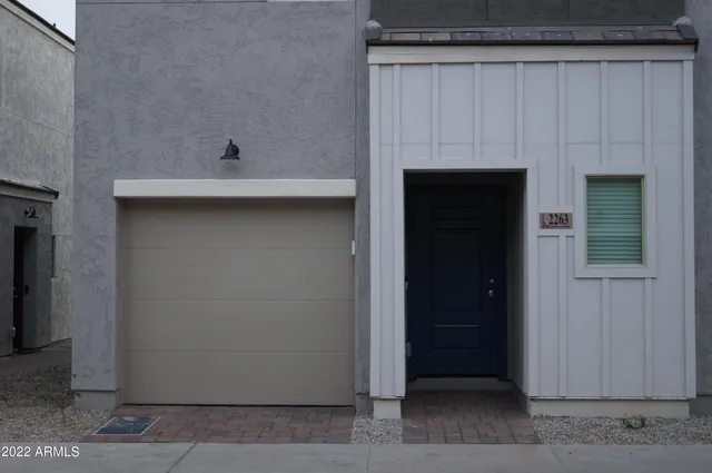 a view of a hallway with washer and dryer