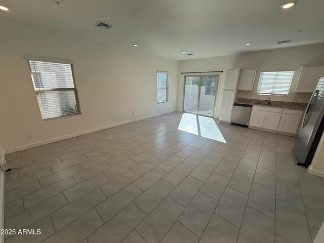 an empty room with furniture