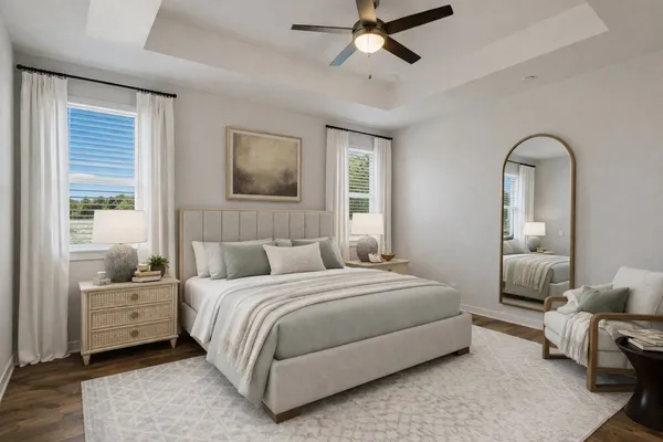 a bedroom with bed and a window