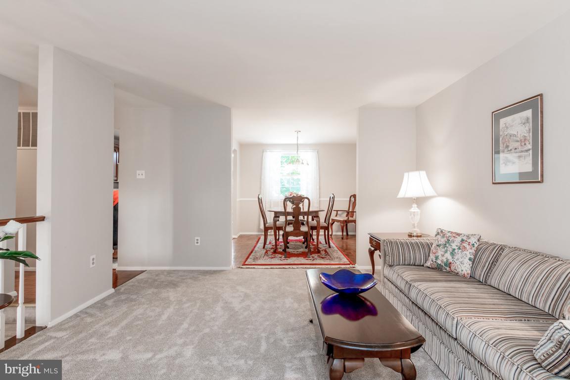 4540 Ambermill Road Baltimore, MD 21236 - Photo 4 of 30 Living Room freshly painted & new carpeting