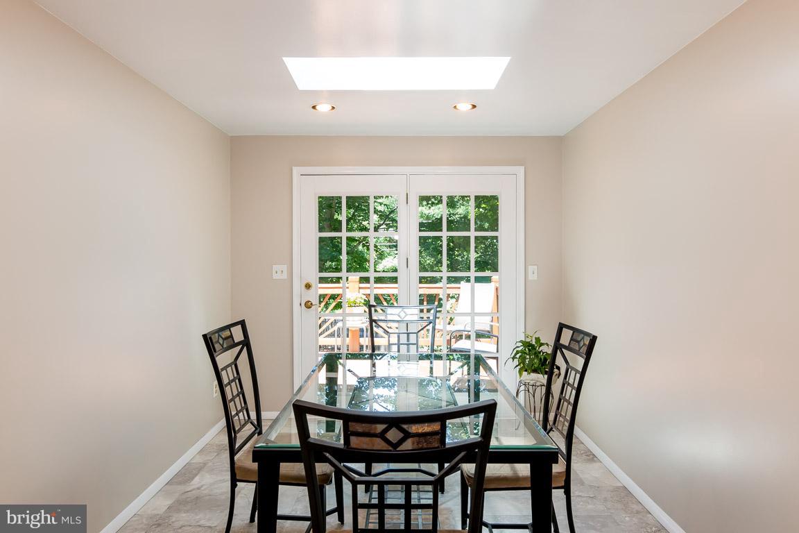 4540 Ambermill Road Baltimore, MD 21236 - Photo 9 of 30 Kitchen/breakfast room w/french doors to deck