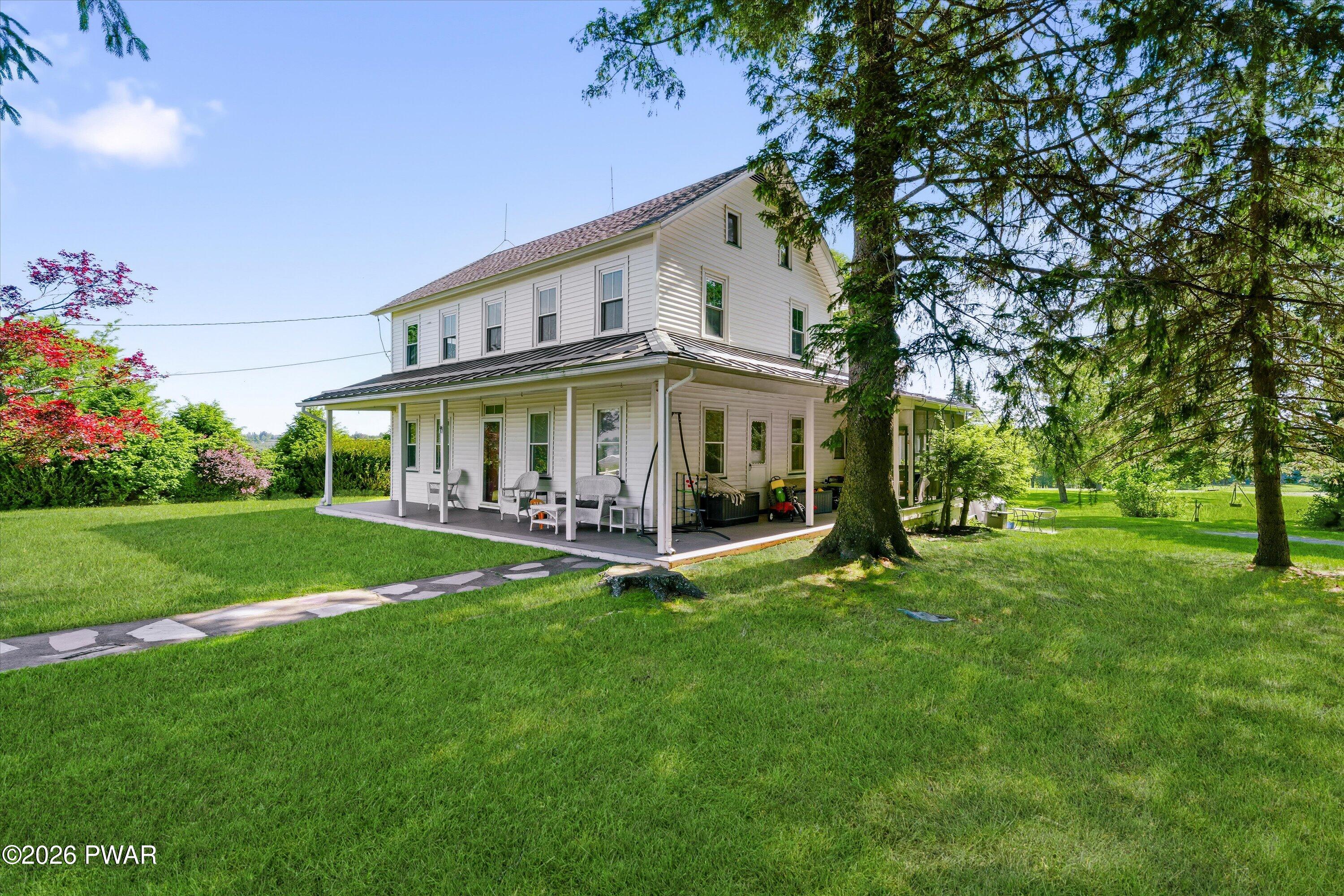 127 Valleyview Road Greentown, PA 18426 - Photo 59 of 66 a view of house with garden