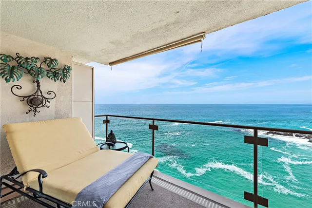 a view of a swimming pool from a balcony