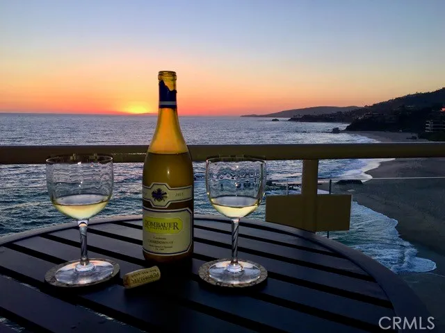 a view of a swimming pool with chairs