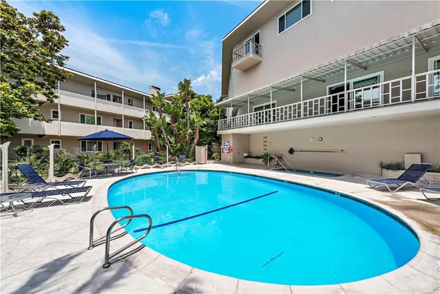 a view of a city with mountains in the background