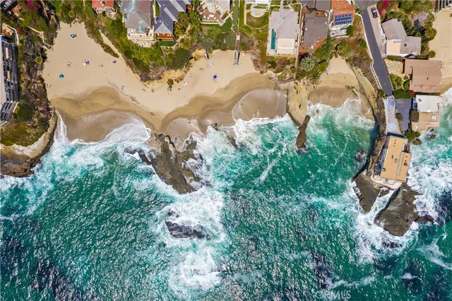 a view of a city with mountains in the background