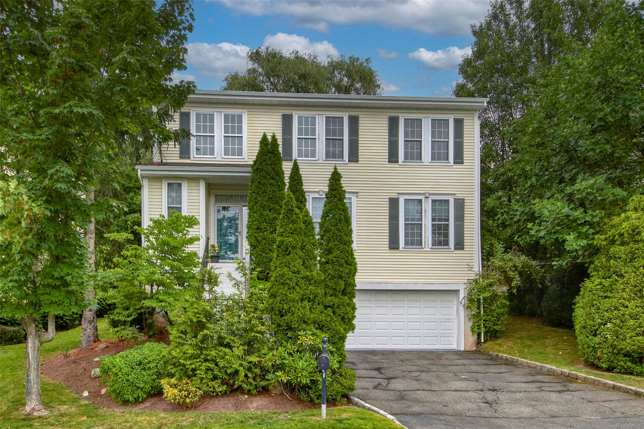 36 Bellefair Road Rye Brook, NY 10573 - Photo 1 of 1 front view of house with a yard