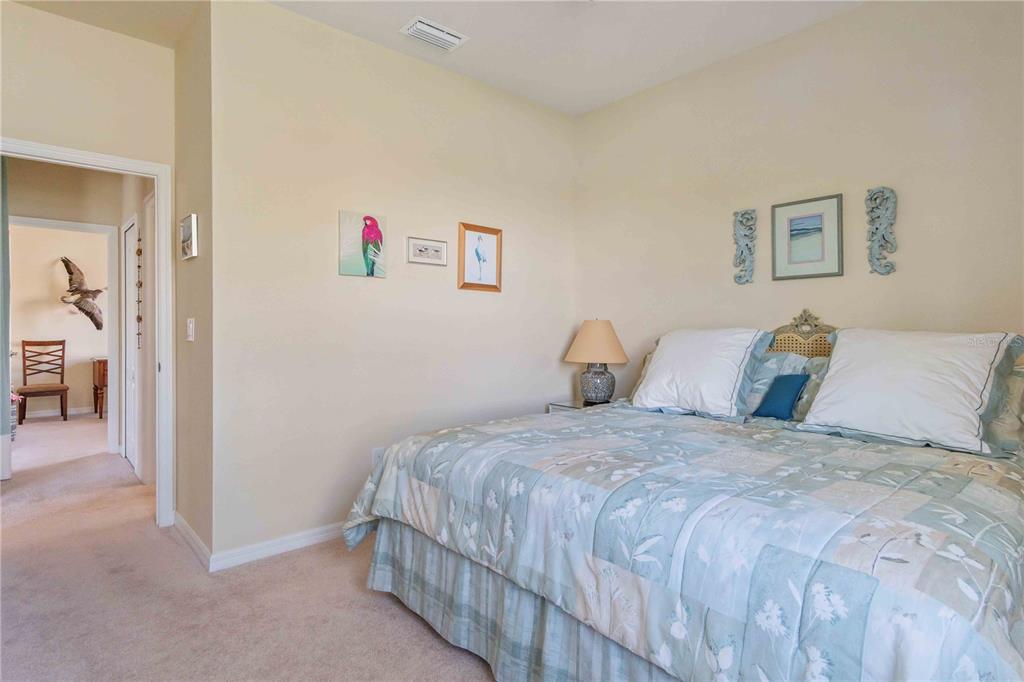 20370 Grazie Place Venice, FL 34293 - Photo 52 of 86 a bedroom with a bed and a view of bedroom