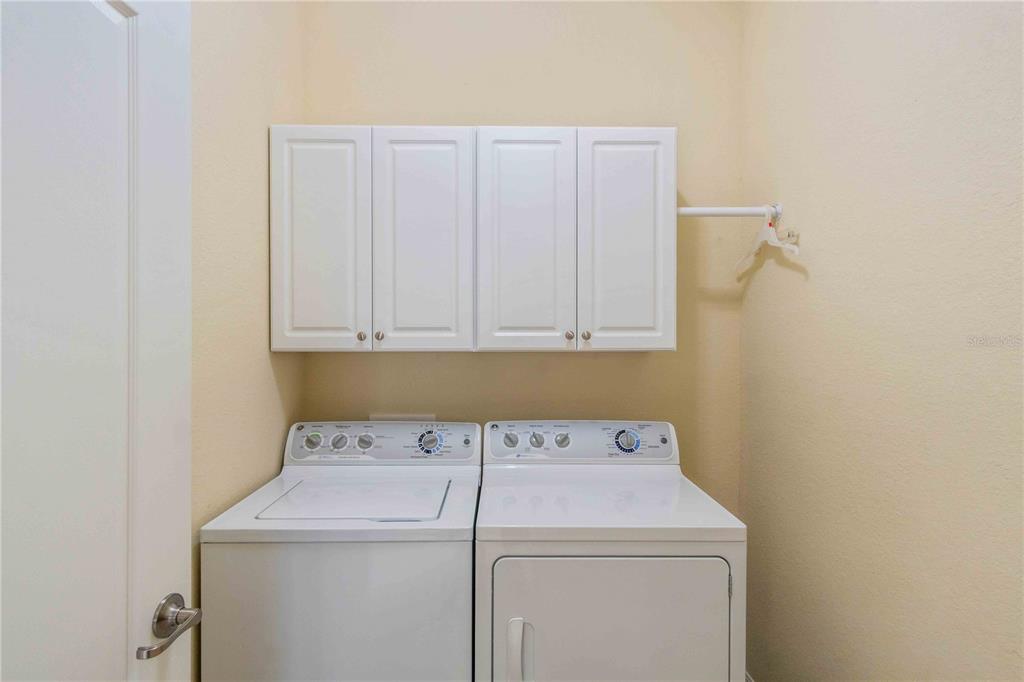 20370 Grazie Place Venice, FL 34293 - Photo 70 of 86 a utility room with dryer and washer