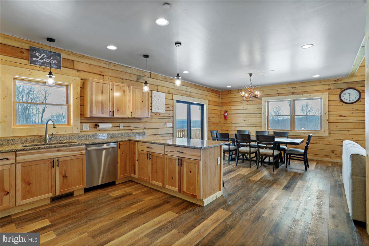 957 North Camp Road McHenry, MD 21541 - Photo 12 of 53 a kitchen with lots of counter top space and dining table