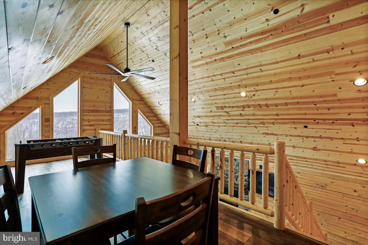 957 North Camp Road McHenry, MD 21541 - Photo 18 of 53 a view of a balcony with chairs