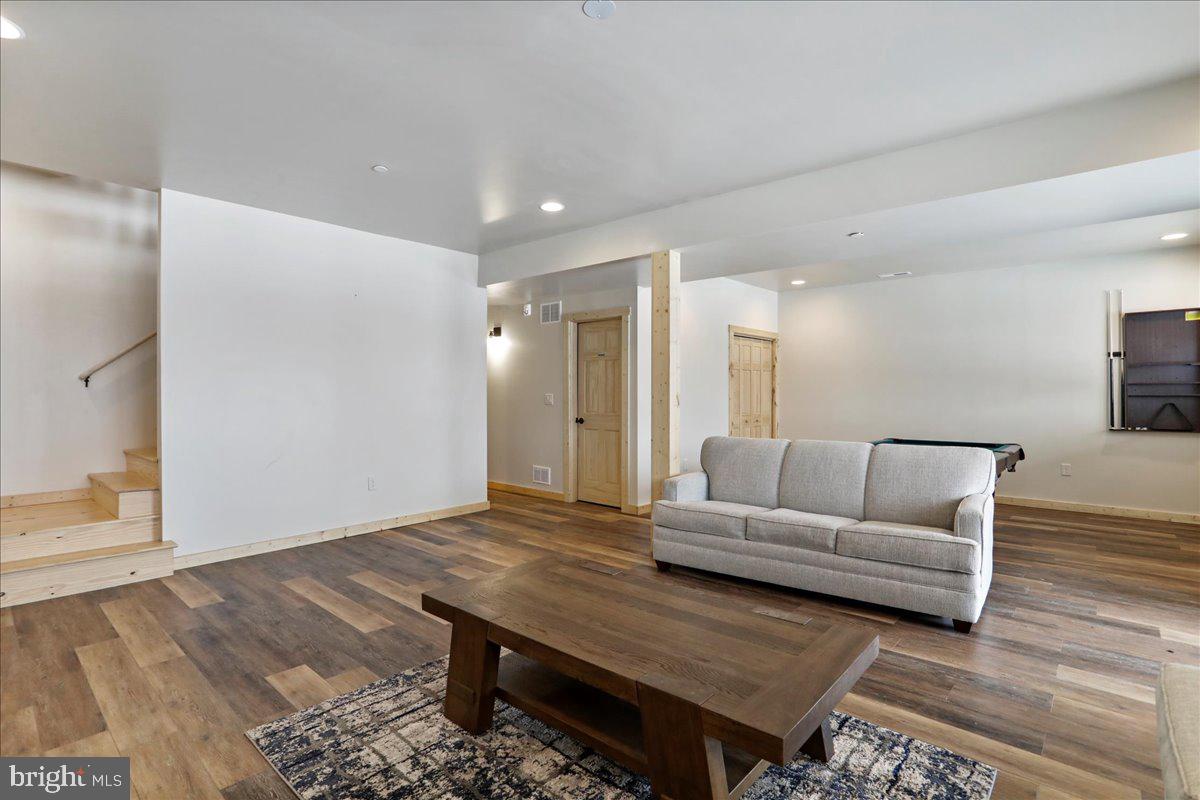 957 North Camp Road McHenry, MD 21541 - Photo 31 of 53 a living room with furniture and a wooden floor
