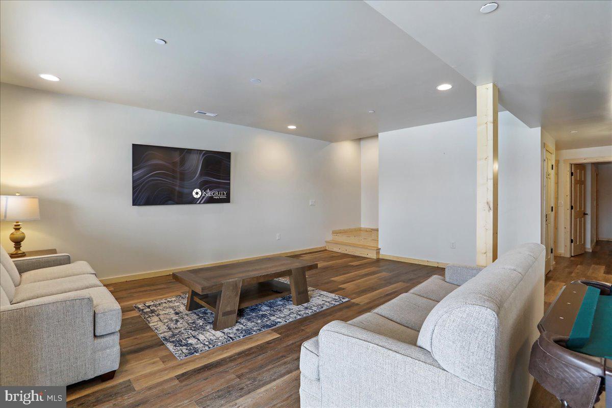 957 North Camp Road McHenry, MD 21541 - Photo 32 of 53 a living room with furniture and a flat screen tv