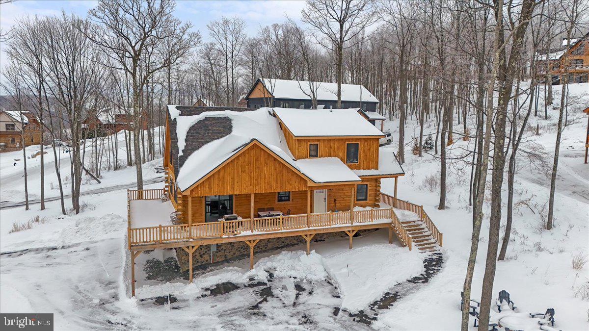 957 North Camp Road McHenry, MD 21541 - Photo 50 of 53 a house with trees in the background