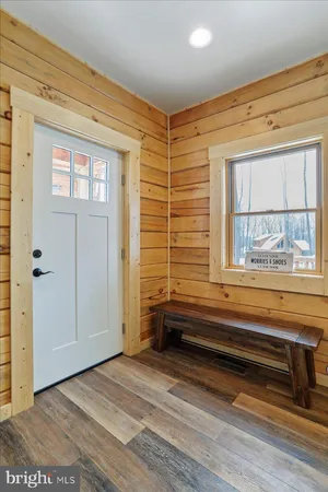 a kitchen with a stove a microwave and a refrigerator