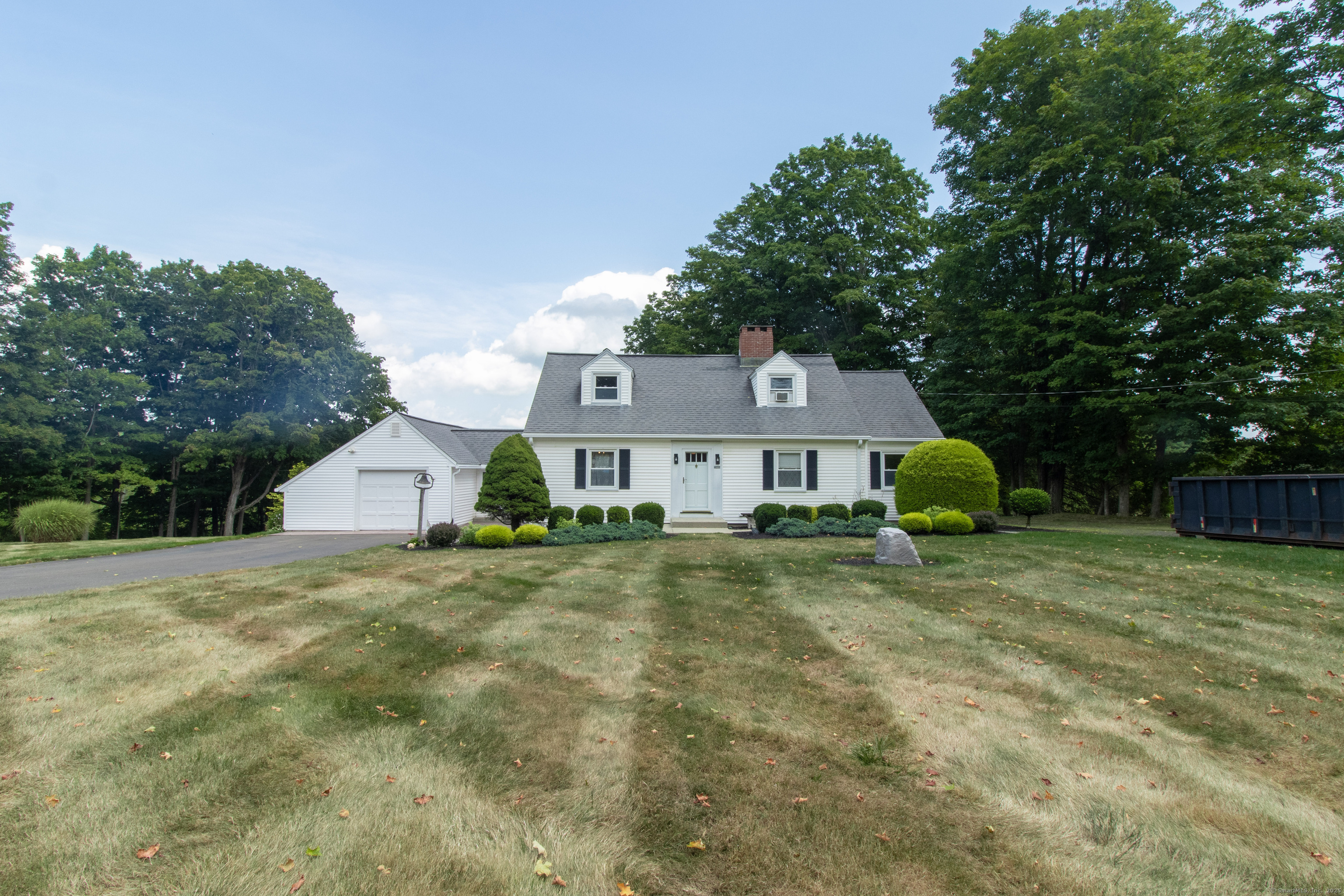 2865 Long Hill Road Guilford, CT 06437 - Photo 1 of 1 a view of a house with a big yard and large tree