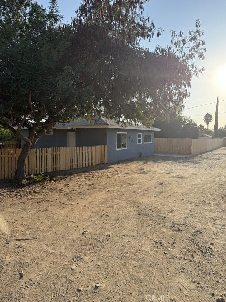 8044 Michael Drive San Bernardino, CA 92410 - Photo 19 of 22 a view of balcony with wooden fence