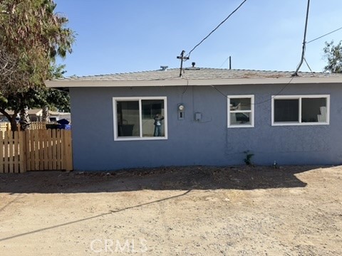 8044 Michael Drive San Bernardino, CA 92410 - Photo 4 of 22 a front view of a house