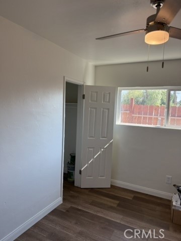 8044 Michael Drive San Bernardino, CA 92410 - Photo 10 of 22 an empty room with wooden floor and windows