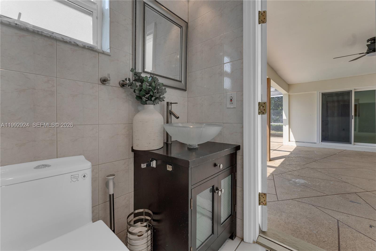 6924 Northwest 8th Court Margate, FL 33063 - Photo 23 of 38 a view of bathroom with a toilet