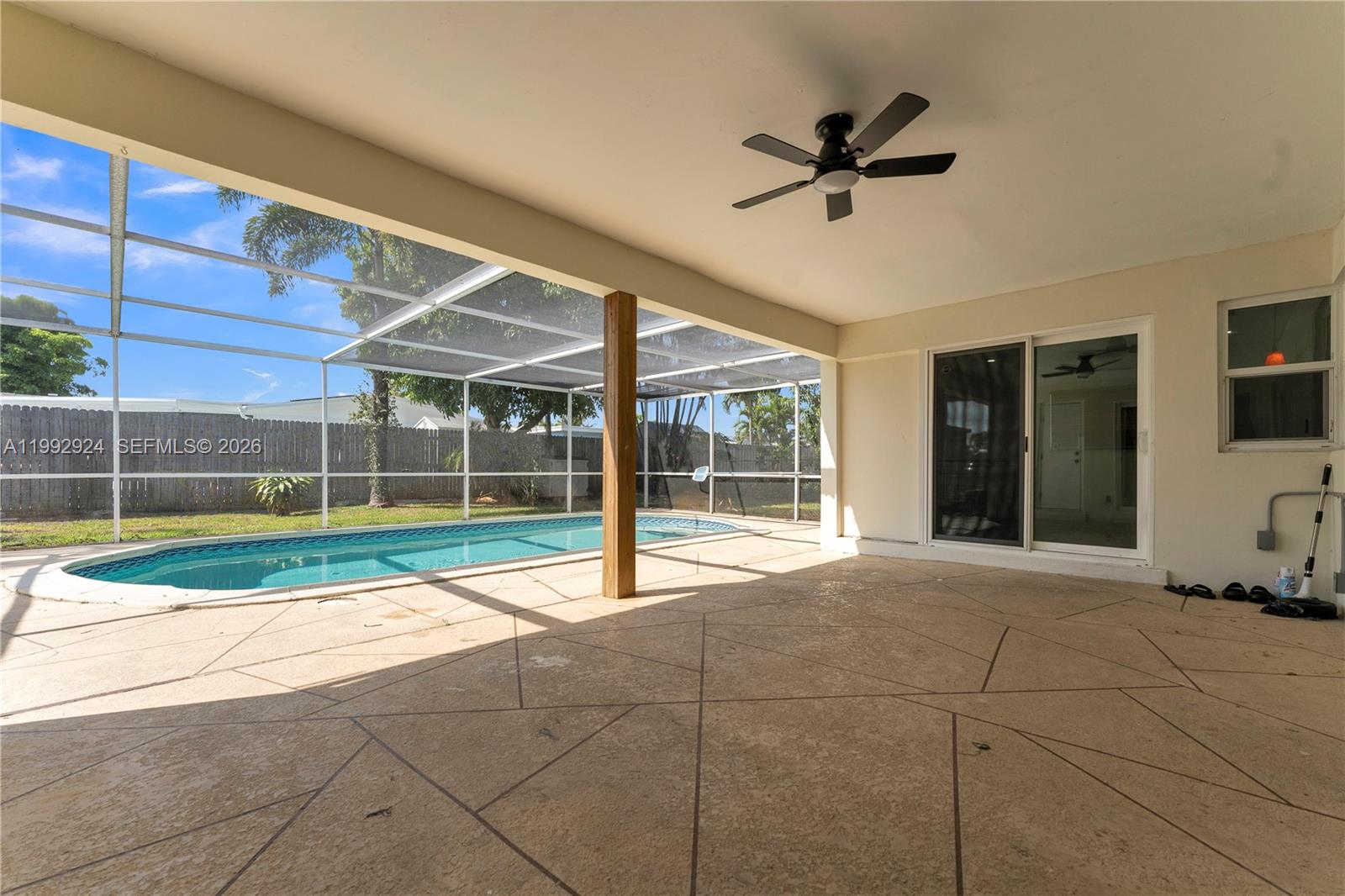 6924 Northwest 8th Court Margate, FL 33063 - Photo 30 of 38 a view of a house with a backyard