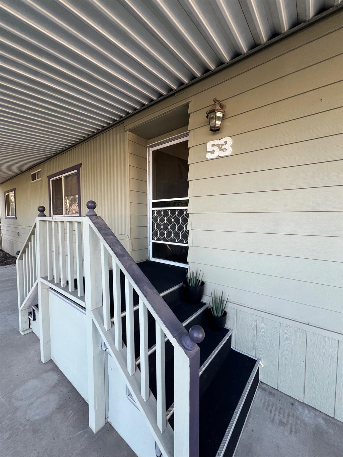 3955 Coffee Road, Unit 53 Modesto, CA 95355 - Photo 2 of 39 a view of staircase with white walls