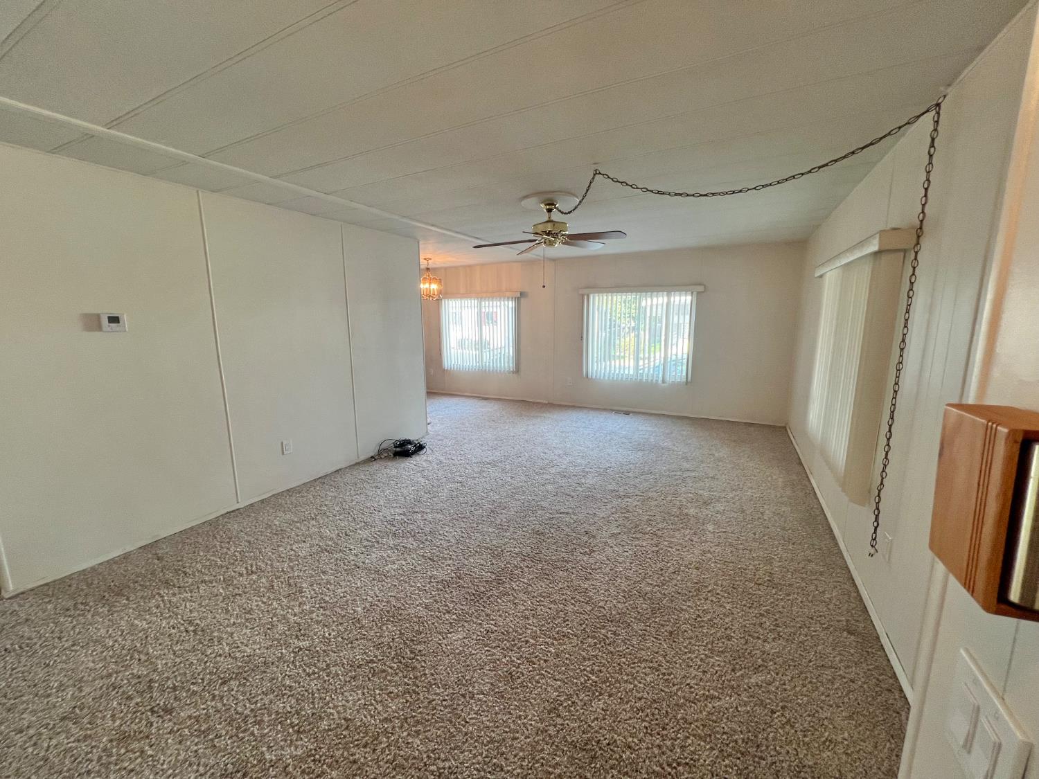 3955 Coffee Road, Unit 53 Modesto, CA 95355 - Photo 27 of 39 a view of livingroom and window