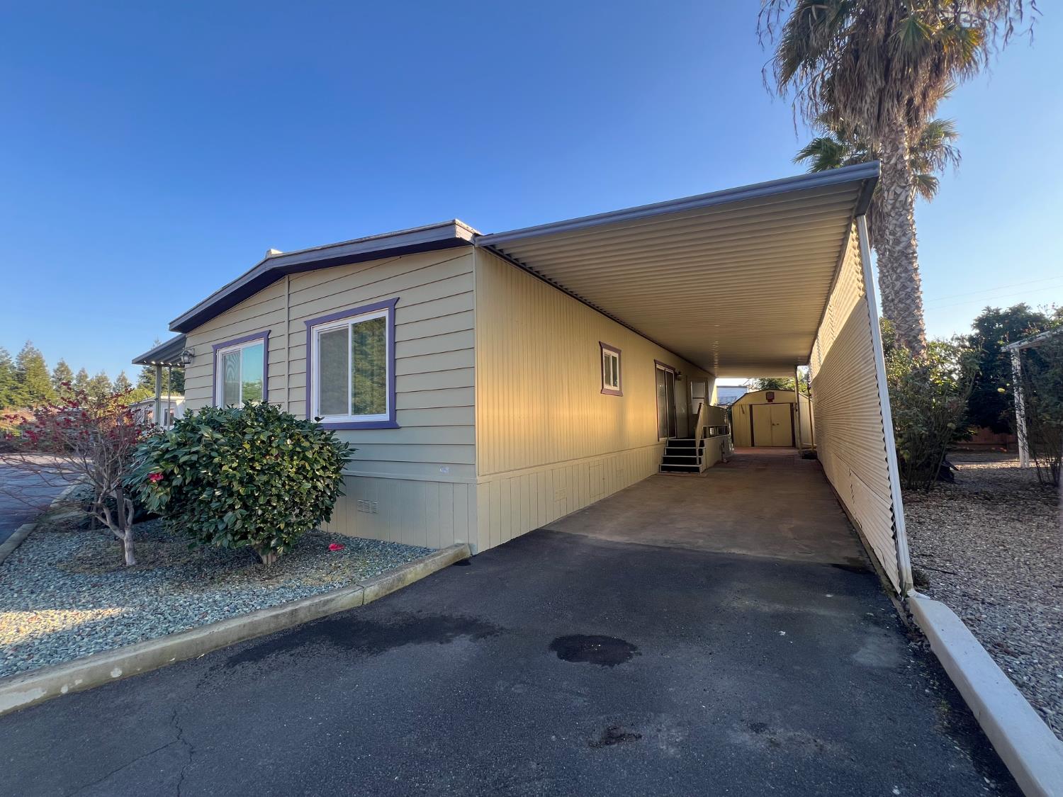 3955 Coffee Road, Unit 53 Modesto, CA 95355 - Photo 3 of 39 a view of a house with a backyard