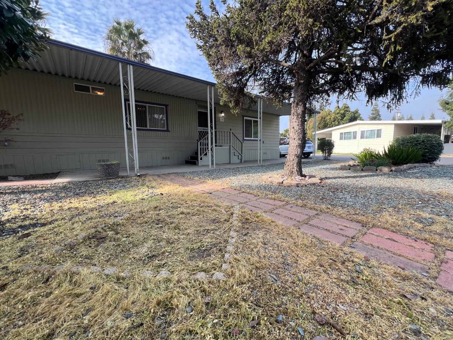 3955 Coffee Road, Unit 53 Modesto, CA 95355 - Photo 33 of 39 a backyard of a house