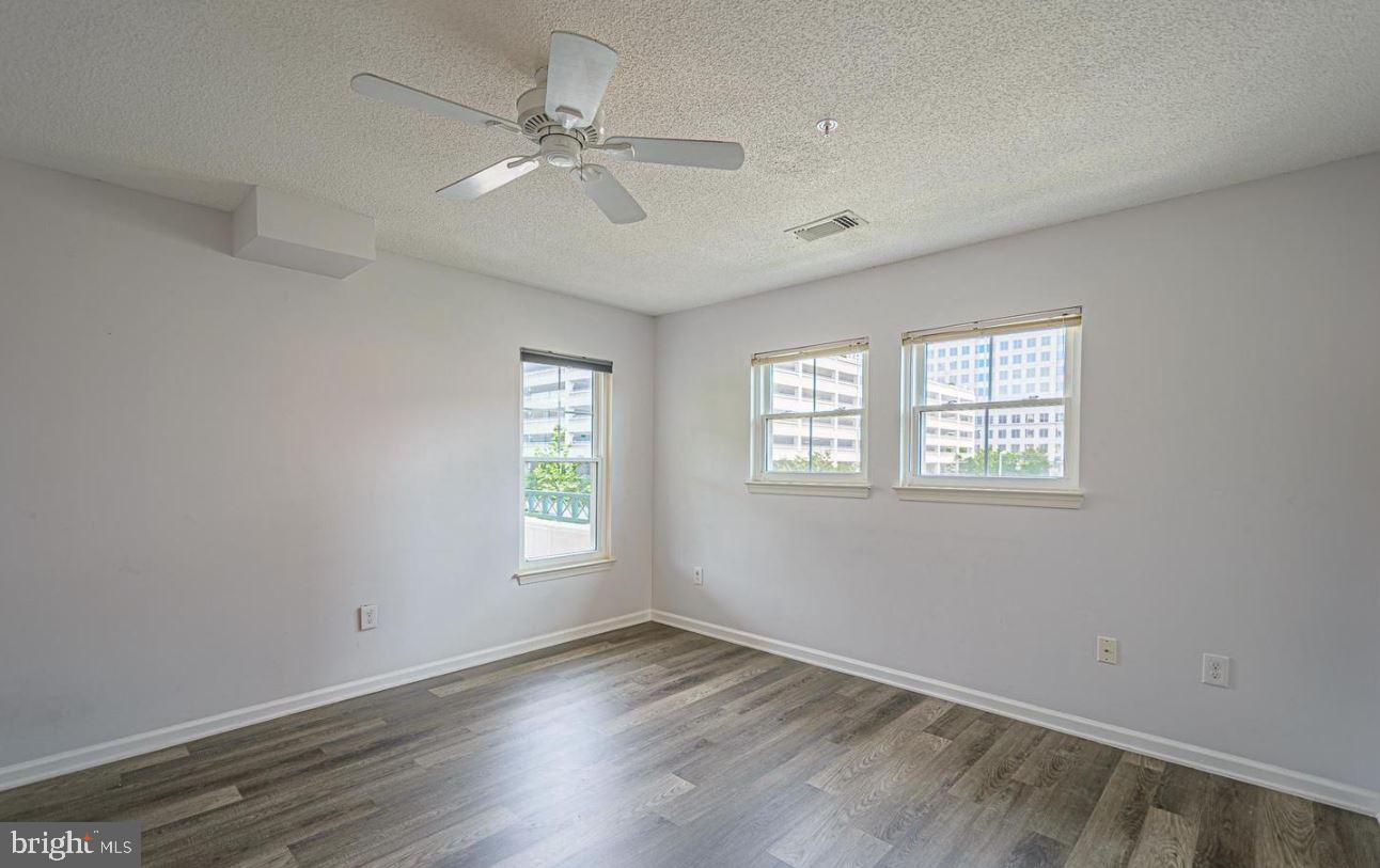 12001 Taliesin Place, Unit 33 Reston, VA 20190 - Photo 11 of 32 Your primary bedroom has great windows to patio