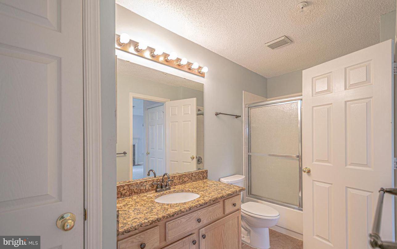 12001 Taliesin Place, Unit 33 Reston, VA 20190 - Photo 13 of 32 And dedicated access to the primary bedroom