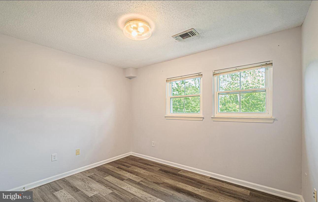 12001 Taliesin Place, Unit 33 Reston, VA 20190 - Photo 17 of 32 Great windows & light in your second bedroom