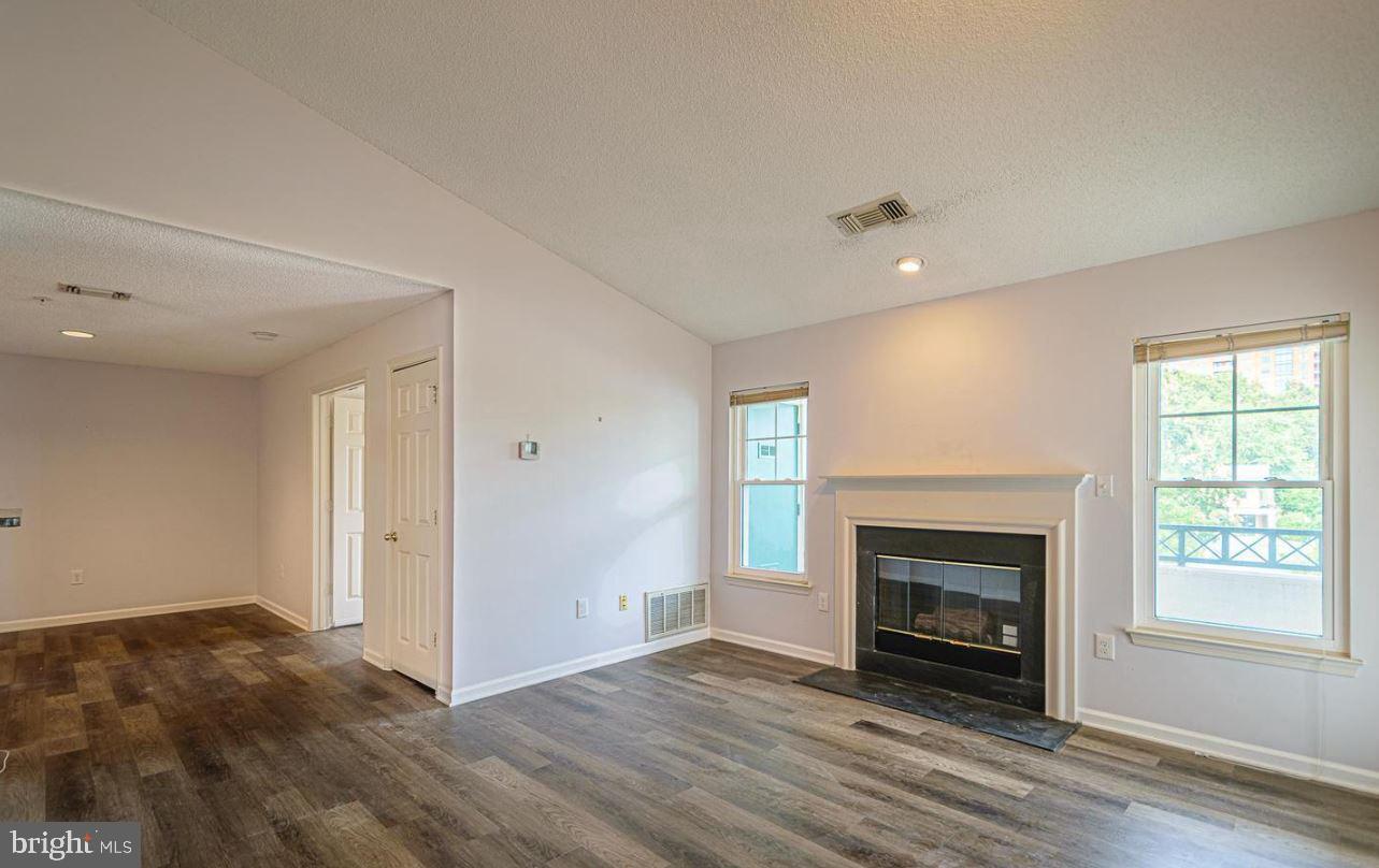 12001 Taliesin Place, Unit 33 Reston, VA 20190 - Photo 7 of 32 Gas fireplace in your living room