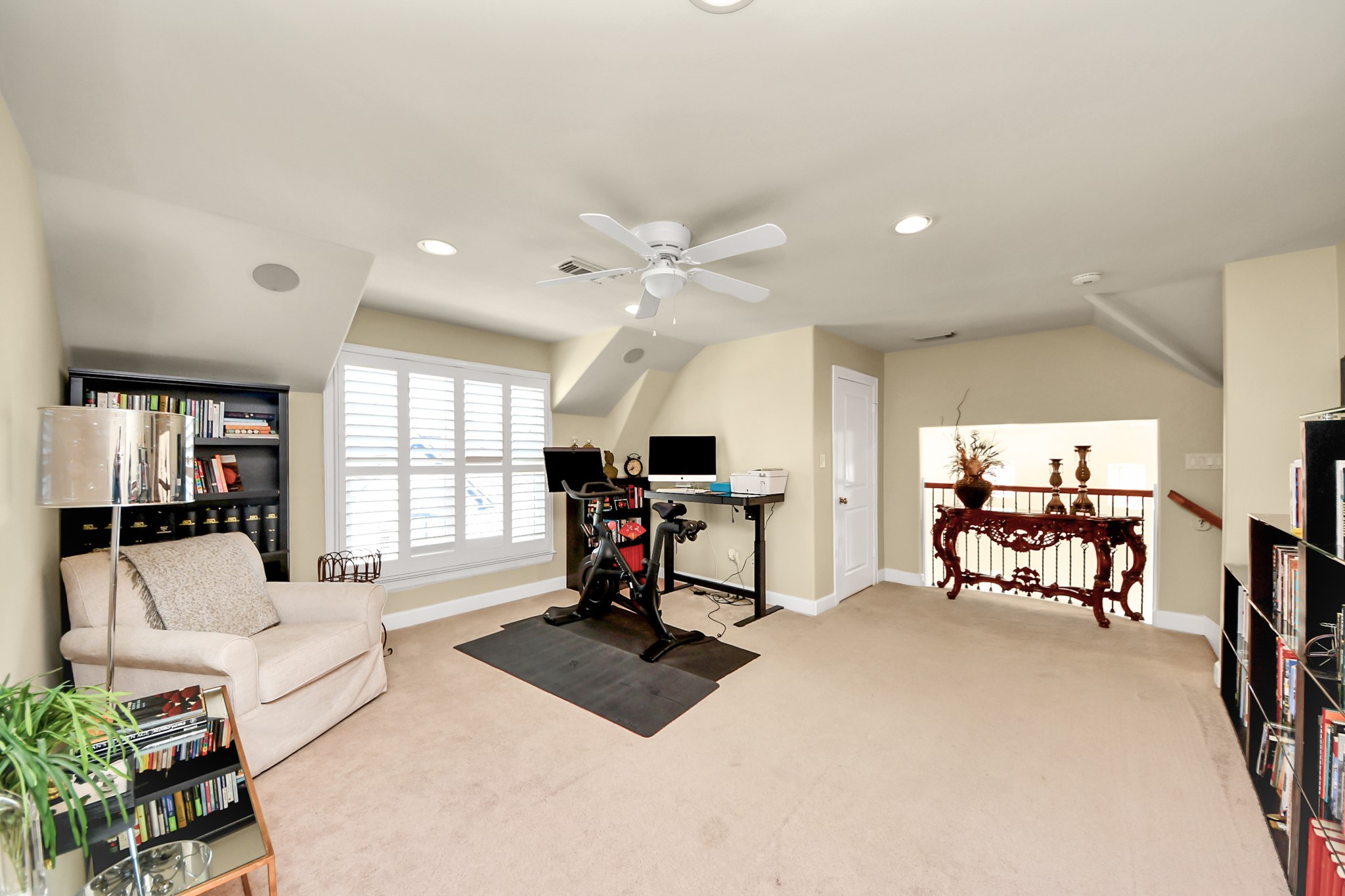 6302 Hermann Lake Drive Houston, TX 77021 - Photo 39 of 50 Plantation shutters, recessed lighting, and ceiling fans enhance the comfort of the space, while the thoughtful layout allows for both relaxation and functionality, making this level a true bonus to the home.
